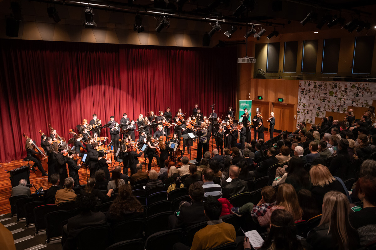 a full audience at the young mannheim symphonists 2024 national academy concert conducted by rachael beesley at felton hall, melbourne grammar. hikari photography.